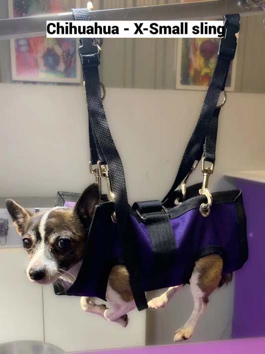 Small black ReNewedPet pet grooming sling for comfortable, secure grooming of cats and small dogs.