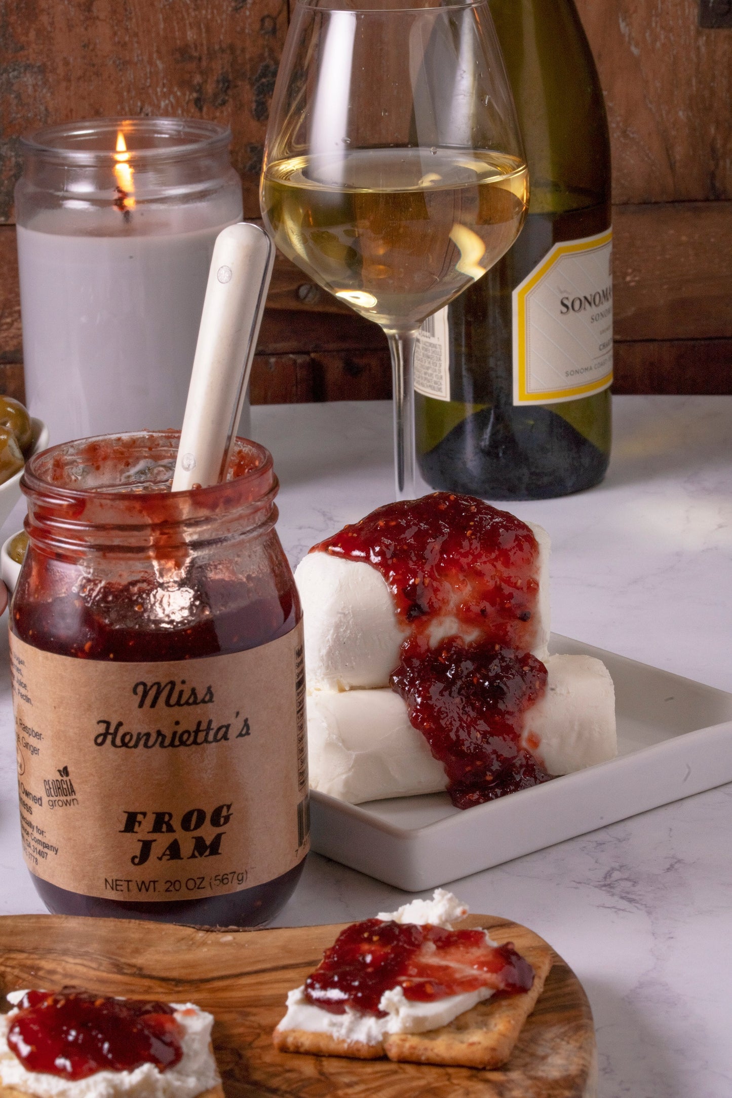 12-pack of SavannahSauceCompany Frog Jam jars, 19 oz each, featuring colorful labels and glass jars for jams and jellies.