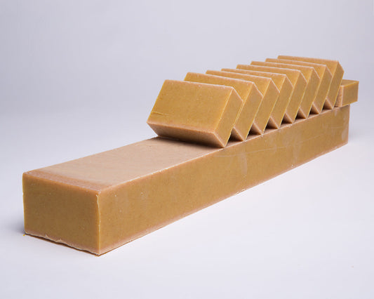 Bar of Soap for Sinners Patchouli Orange with Turmeric soap featuring a natural, earthy appearance with orange and turmeric swirls.