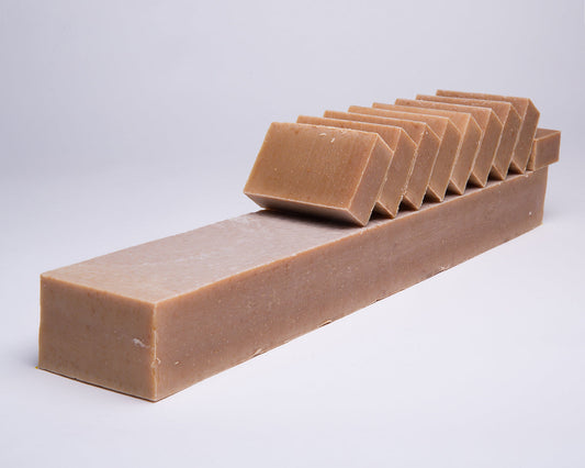 Bar of Soap for Sinners Tea Tree Lemon with Honey soap, showing the textured soap bar with natural ingredients visible.