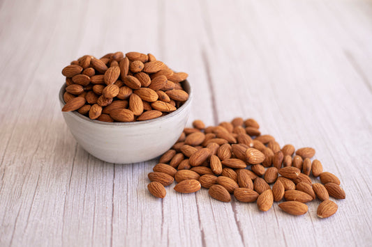 Organic Nonpareil almonds from True California in a 1 lb bag, showing fresh, whole almonds with smooth, light brown shells.