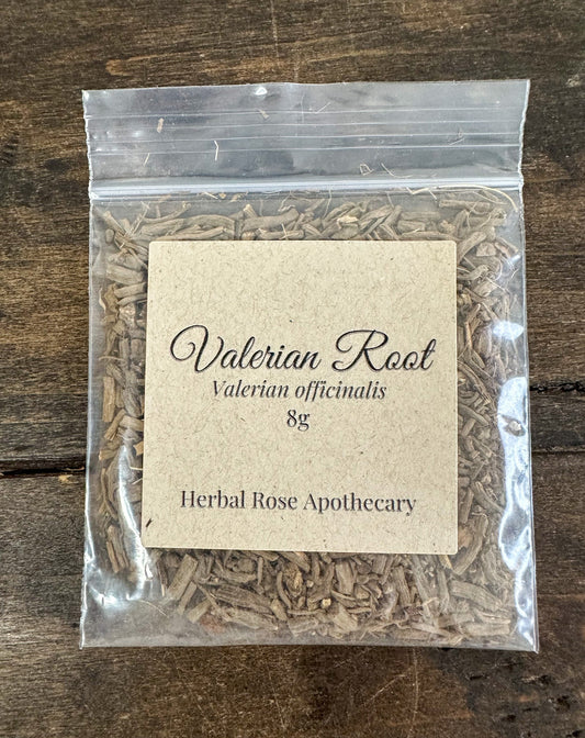 Dried valerian root herbs in an 8g package from HerbalRoseApothecary, showing the earthy, natural herb pieces.