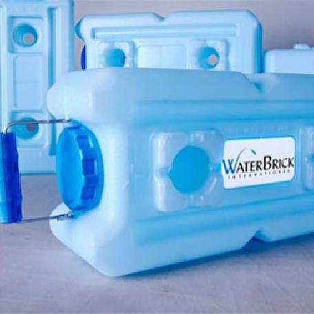 Heaven's Harvest WaterBrick system showing stacked water storage containers for emergency preparedness and outdoor use.