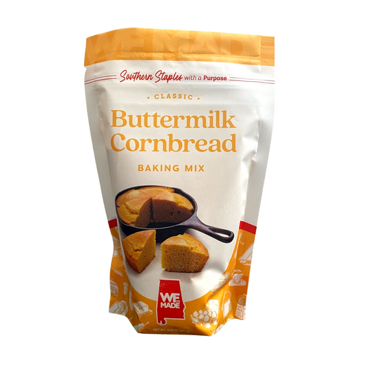 Golden buttermilk cornbread mix by WE Made in a resealable package, ready for baking classic Southern-style cornbread.