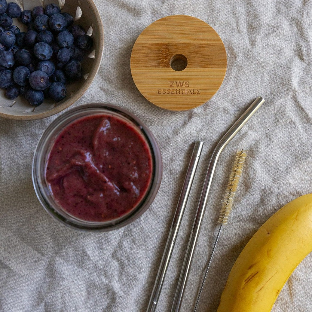 Wide-mouth bamboo mason jar lid for drinkware by ZeroWasteStore.com, featuring a natural bamboo finish and secure fit.