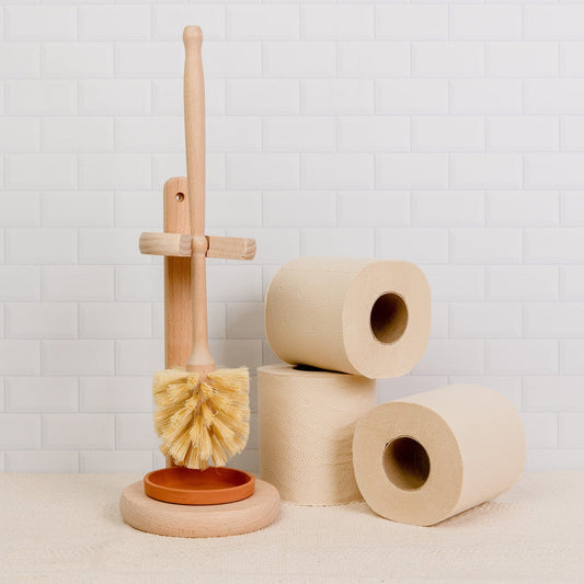 Plastic-free toilet brush with stand from ZeroWasteStore.com, eco-friendly household cleaning supply for bathroom hygiene.