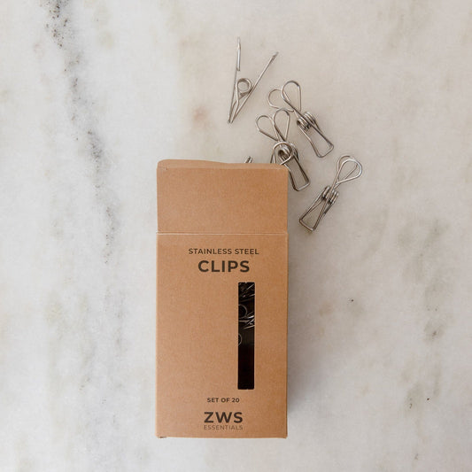 Stainless steel laundry pegs and clothespins from ZeroWasteStore.com, versatile multipurpose clips in a 20-pack for household use.