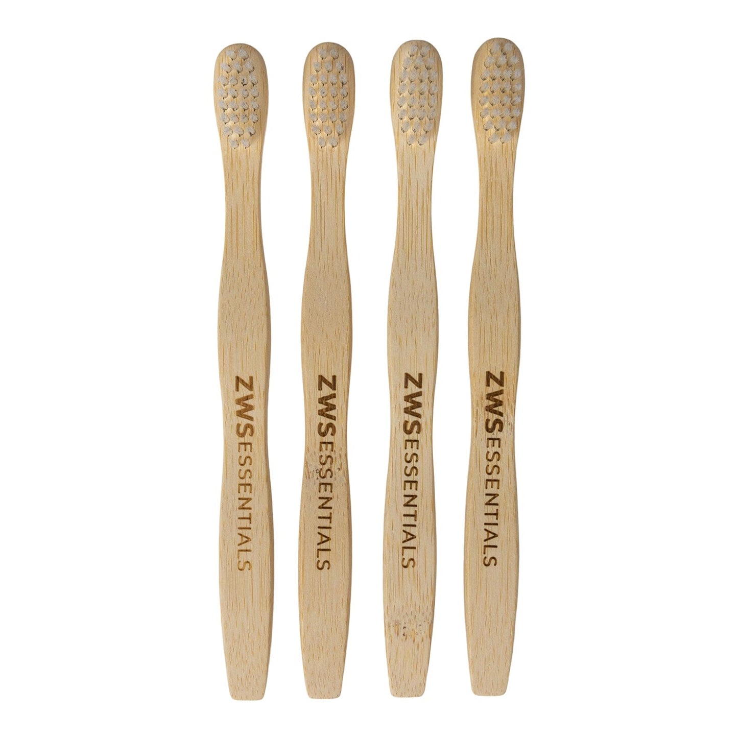 Child's bamboo toothbrush from ZeroWasteStore.com with a green handle and soft bristles, eco-friendly dental care for kids.