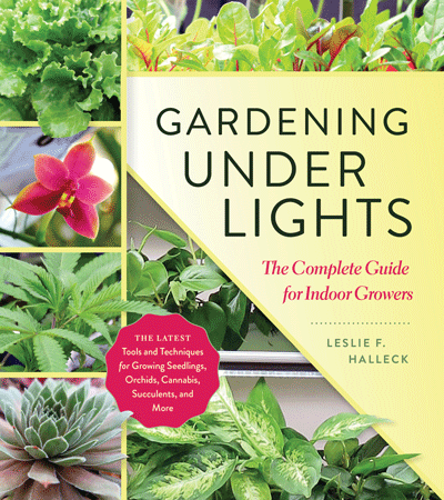 Cover of Gardening Under Lights by Leslie F. Halleck, featuring various green indoor plants and flowers, with text about growing seedlings, orchids, cannabis, succulents, and more.