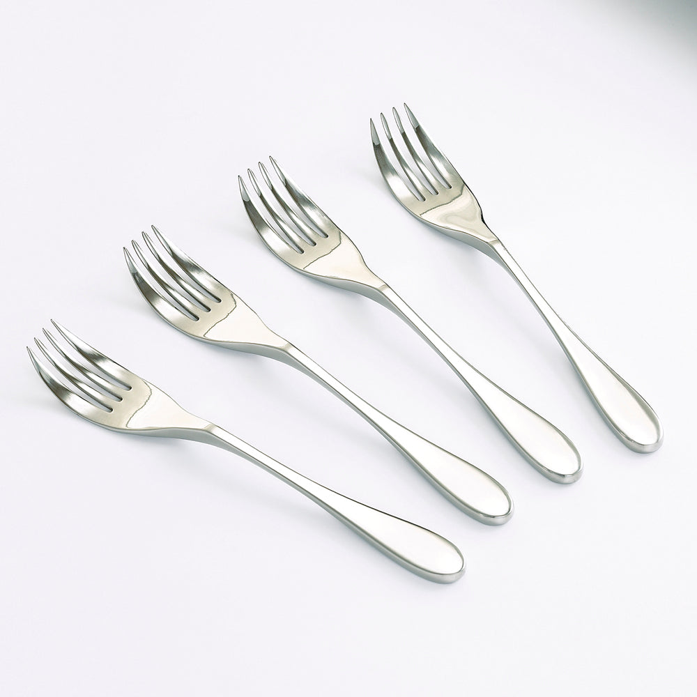 Set of four Knork Original dinner forks, stainless steel cutlery with ergonomic design, suitable for casual and formal dining.