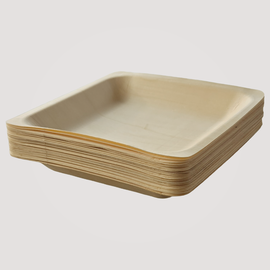Set of four 4.5-inch eco-friendly square wooden plates by MicRic, made from bamboo and palm leaf, ideal for sustainable dining.