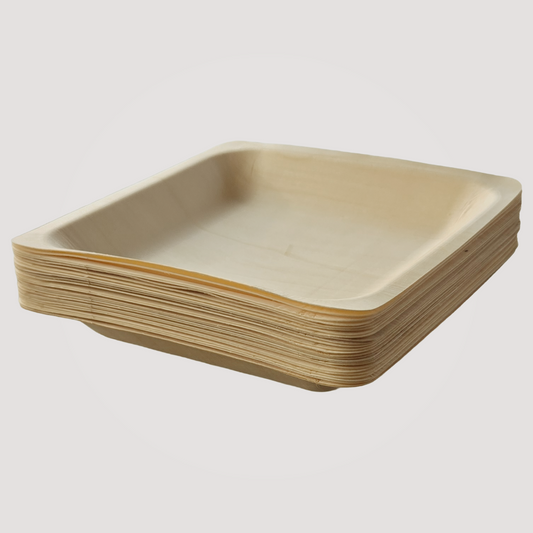 Set of four 4.5-inch eco-friendly square wooden plates by MicRic, made from bamboo and palm leaf, ideal for sustainable dining.