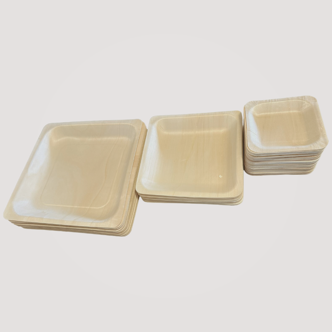 Set of four 4.5-inch eco-friendly square wooden plates by MicRic, made from bamboo and palm leaf for sustainable dining.