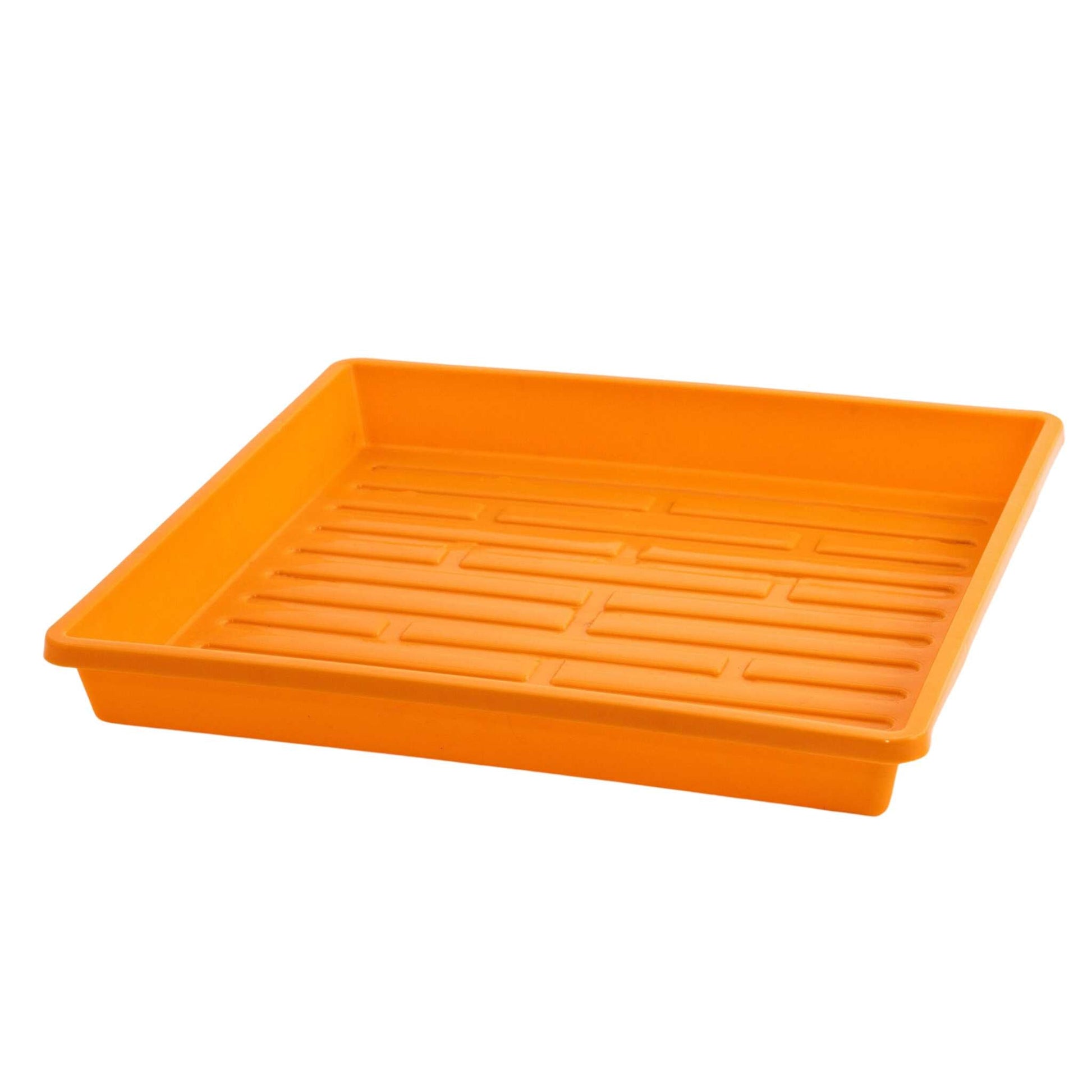 Orange Bootstrap Farmer 1010 shallow seed trays with drainage holes, ideal for starting seedlings and propagation.