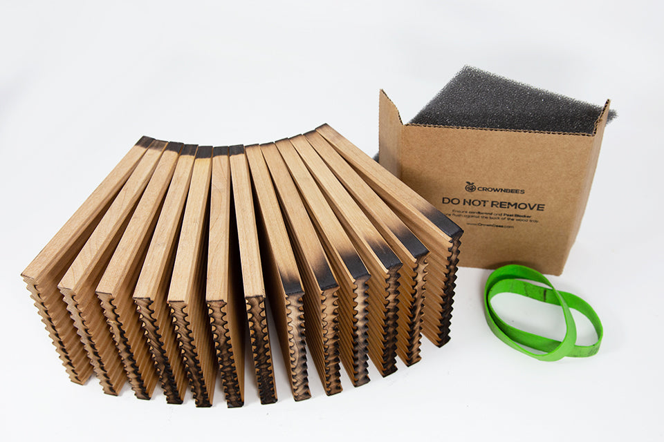 CrownBees summer reusable wood tray with 156 holes, designed for summer leaf bees, spread out showing detailed honeycomb compartments.