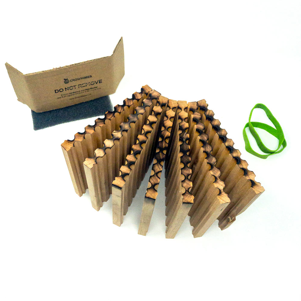 Spring reusable wood mason bee tray by CrownBees with 8mm holes, designed for nesting and bee conservation.