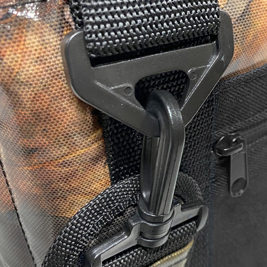 Polar Bear Coolers 12-pack nylon soft coolers in camouflage, showing the insulated interior and durable exterior design.