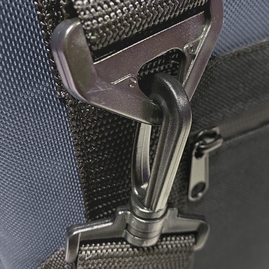 Navy nylon soft cooler from Polar Bear Coolers, 12-pack, showing the insulated exterior and zipper closure for outdoor use.