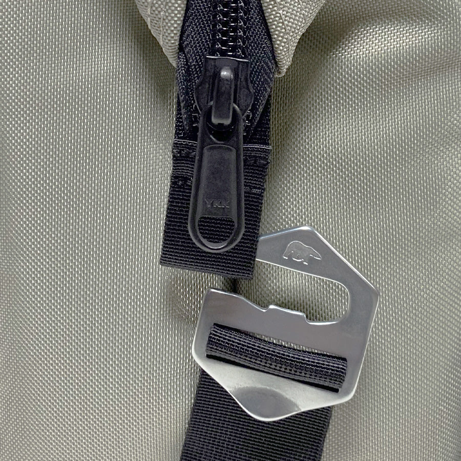 12-pack of Polar Bear Coolers nylon soft coolers in silver, showing side view with compact, lightweight design for outdoor use.