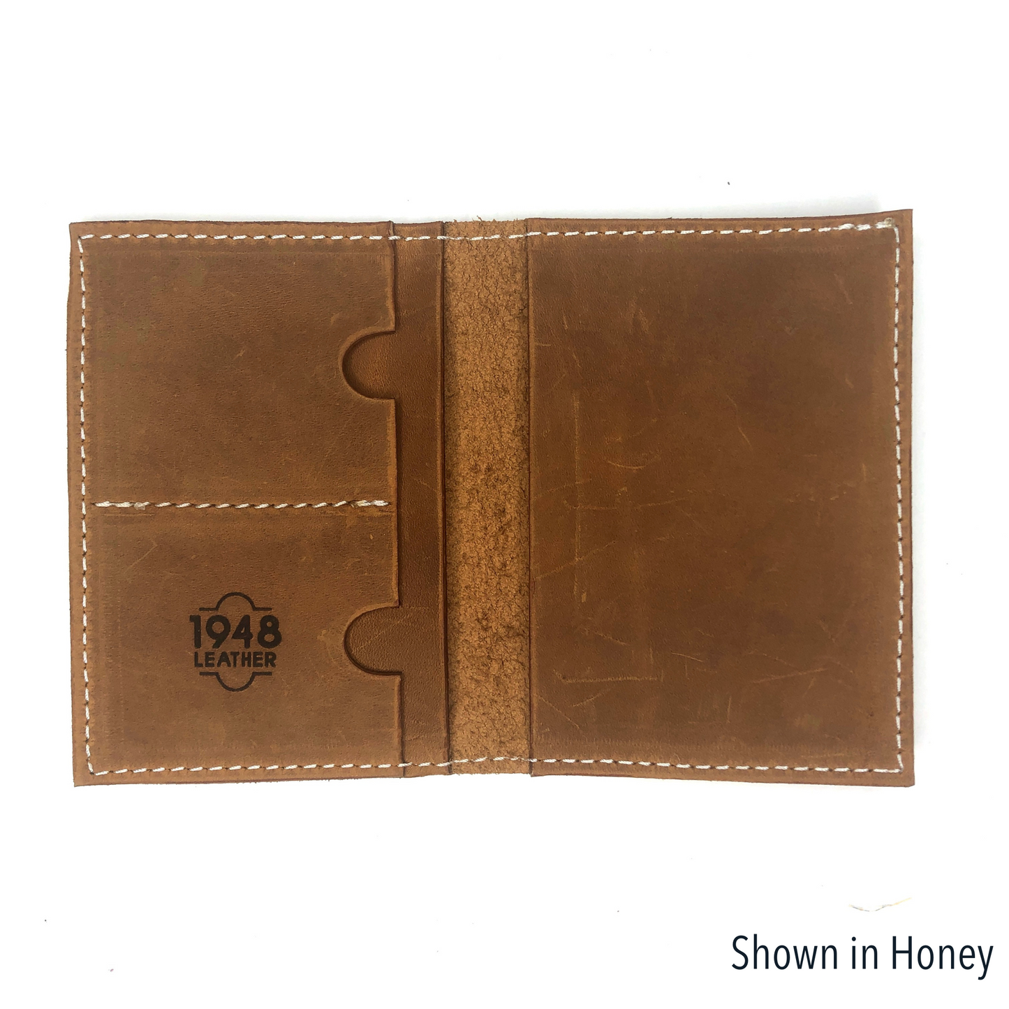 Custom passport wallet by Rebekah Scott Designs featuring a unique design, compact and stylish for secure travel essentials.