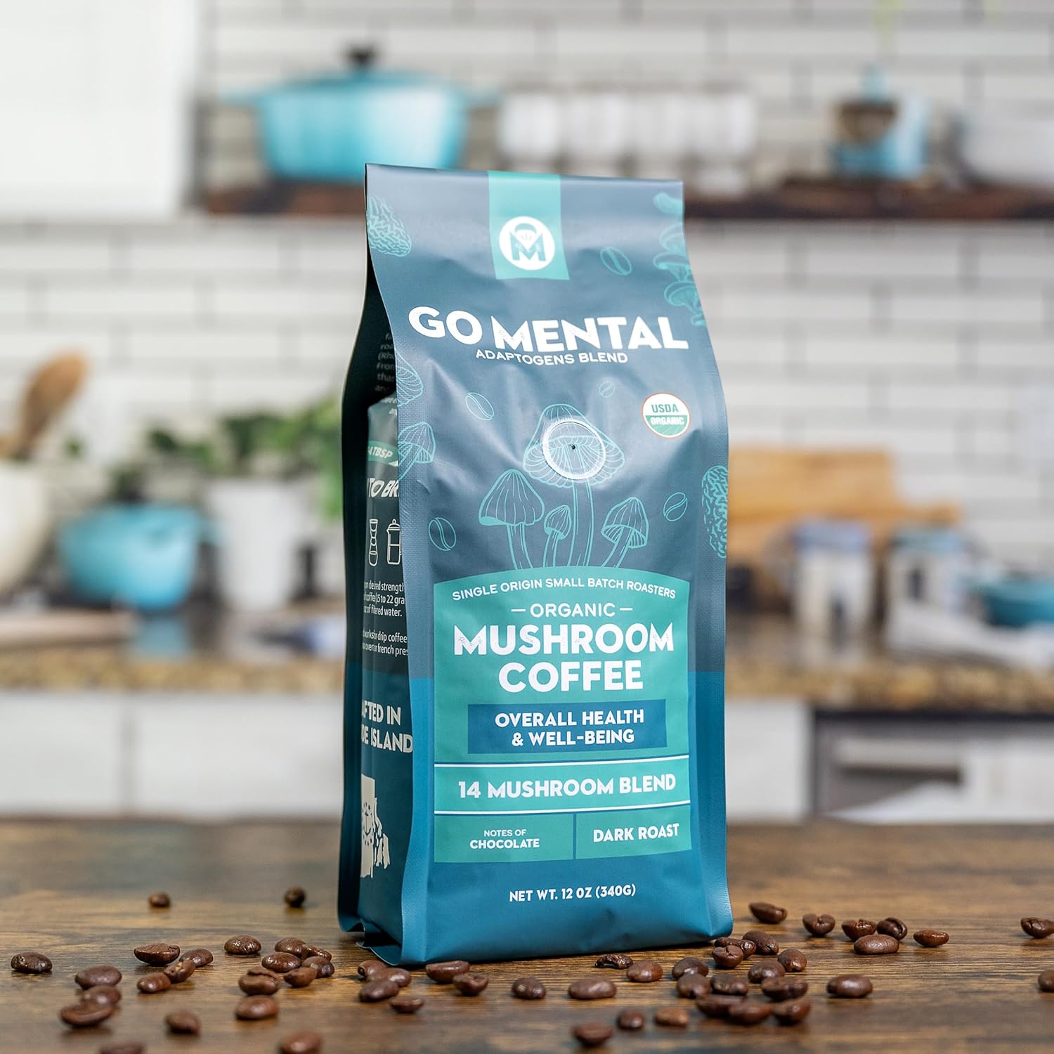 14 Mushroom Coffee Adaptogens Blend by GO MENTAL MUSHROOM COFFEE, featuring a jar of mushroom coffee with fresh mushrooms around it.