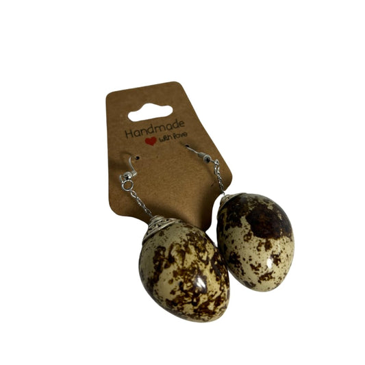 Brown quail egg earrings with gold hooks, handcrafted jewelry featuring natural egg-shaped designs, from Quailz.com by Undique LLC.