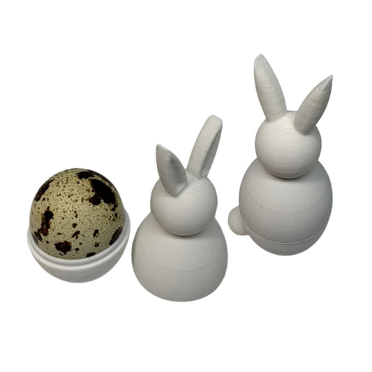 White DIY paintable quail egg cup bunny holder set for Easter and spring home decor, featuring two ceramic egg holders.