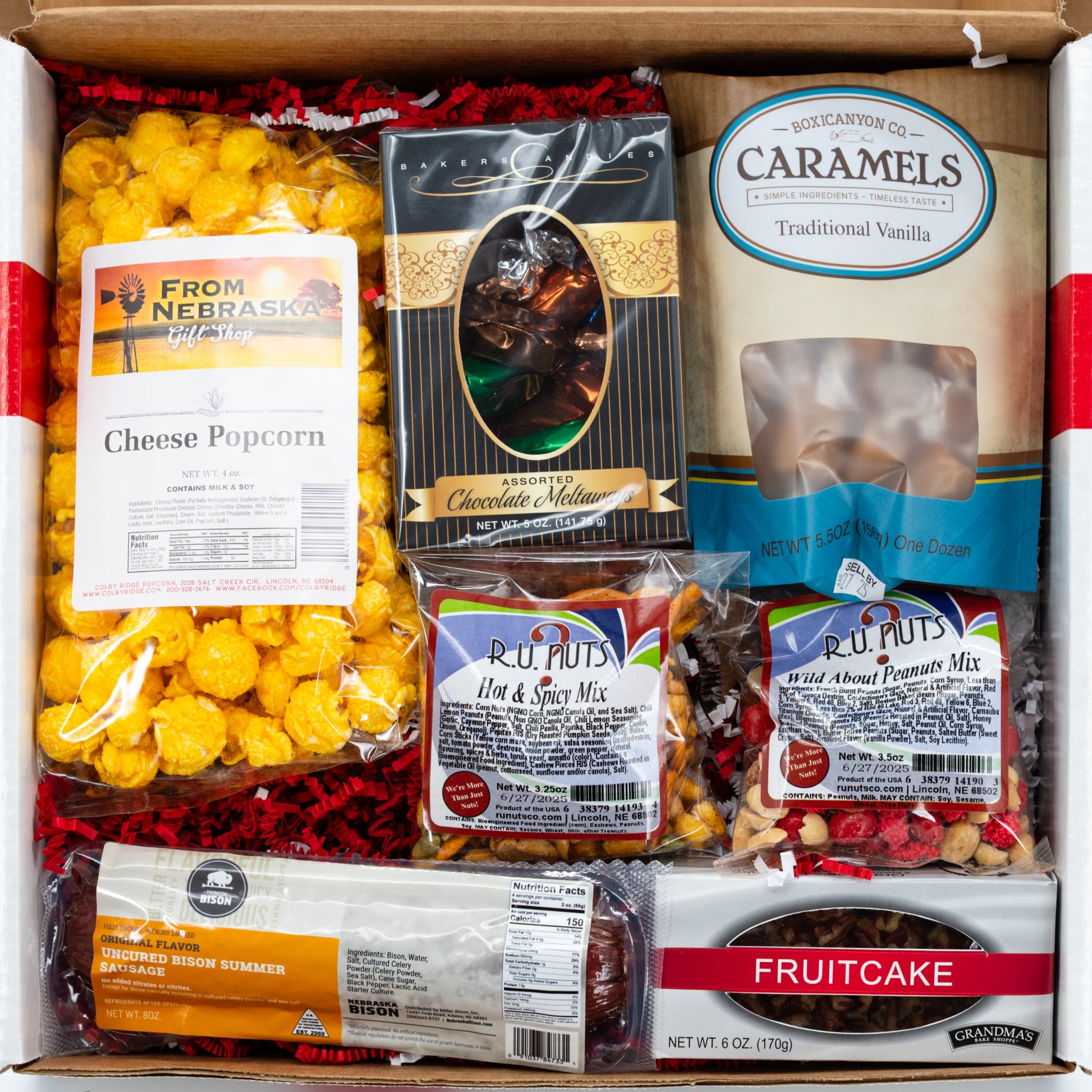 Gift basket from BuyNebraska.com with snacks and treats, part of The Good Life Gift Box collection, featuring Nebraska-themed goodies.