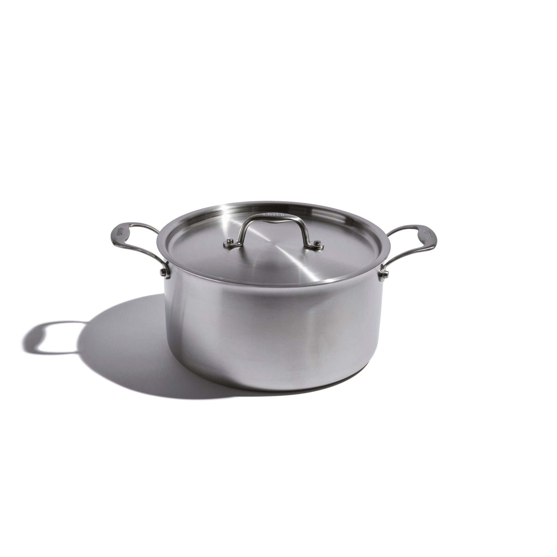 Heritage Steel 8-quart stock pot with lid, durable stainless steel cookware for soups, stews, and large meal preparation.