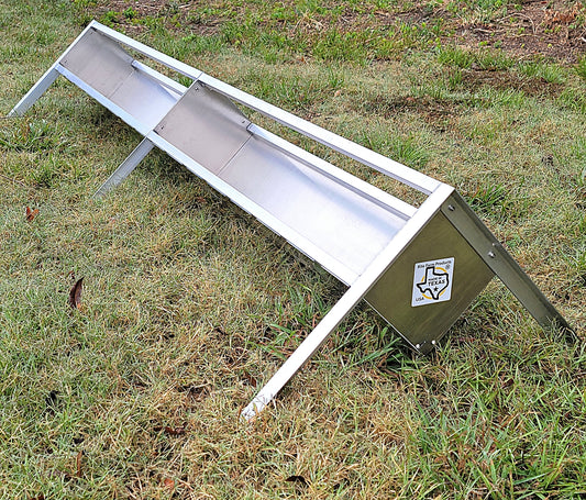 96-inch aluminum sheep and goat V trough feeder with anchors, ideal for livestock, made in the USA, durable and easy to use.