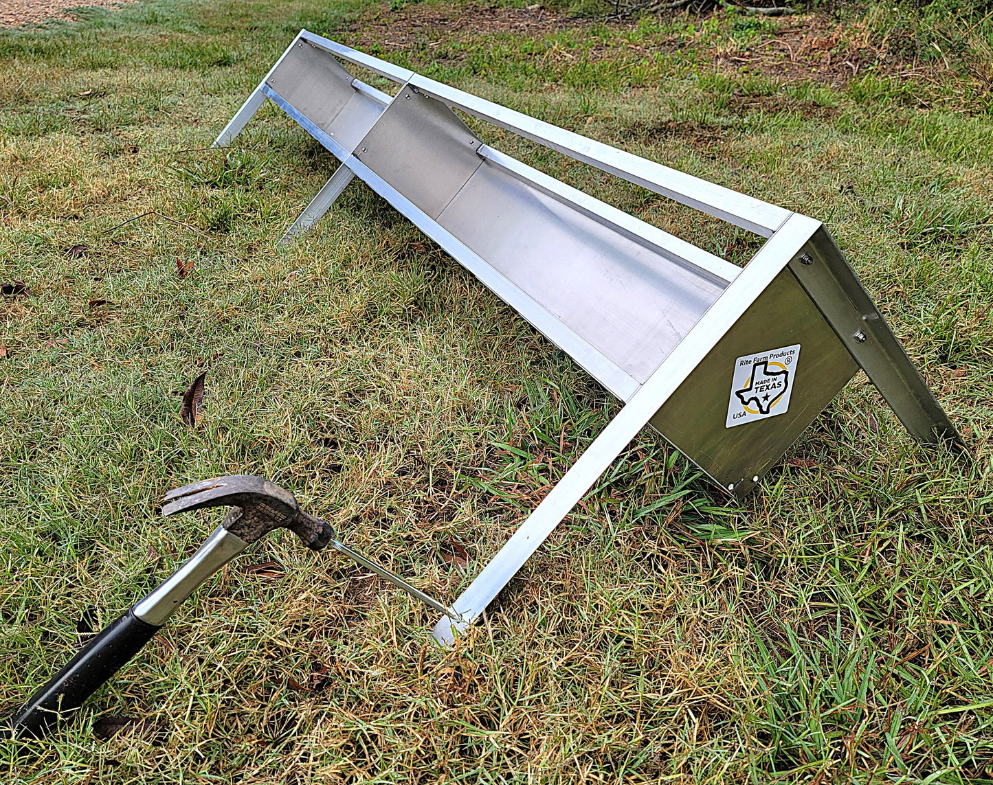 96-inch welded aluminum sheep and goat V trough feeder with anchors, ideal for livestock feeding, made in the USA.