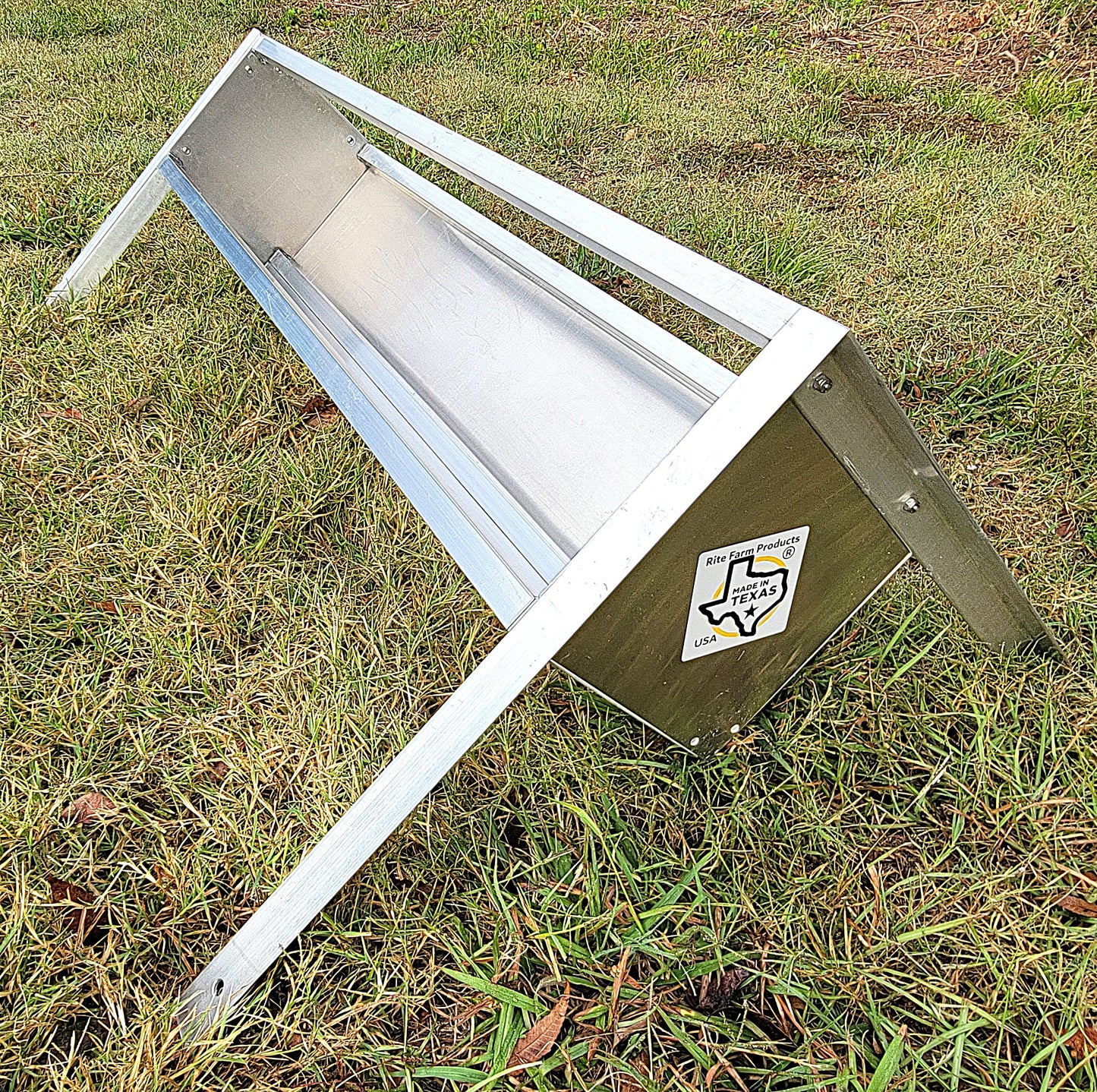 48-inch welded aluminum sheep and goat V trough feeder with anchors, ideal for livestock feeding, made in the USA.