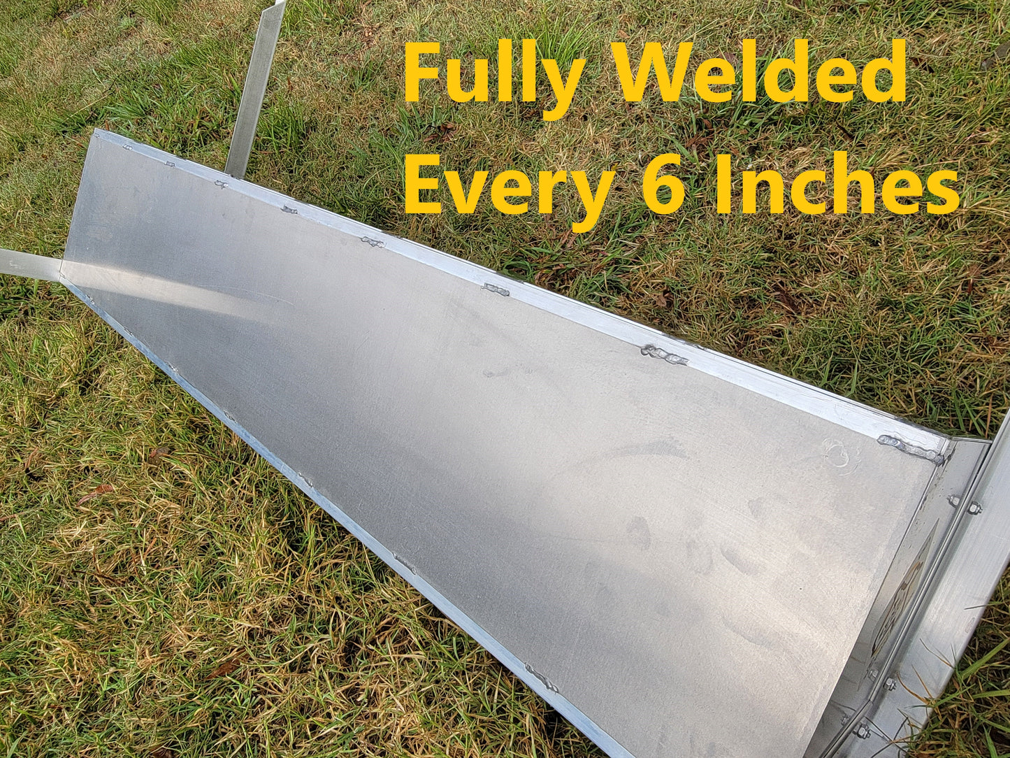 Aluminum sheep and goat V trough feeder with anchors, 96 inches long, durable USA-made livestock feeding equipment