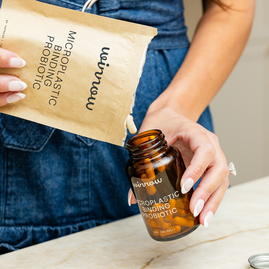 Winnow Daily Probiotic Starter Pack with assorted capsules, featuring colorful bottles and probiotic supplement packaging.