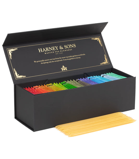 Assorted teabags and honey sampler gift set from Harney & Sons Fine Teas, featuring various teas and honey packets.