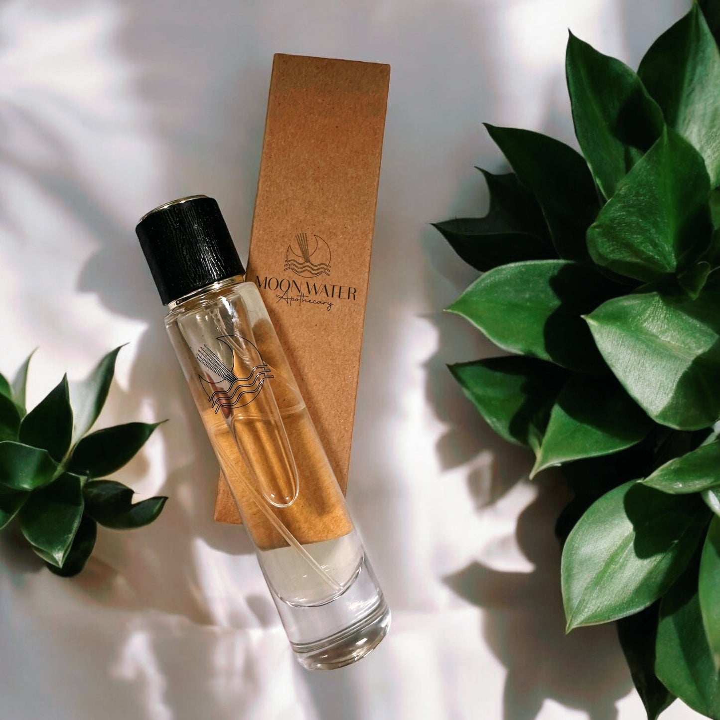 Viral Hair Perfume by Moon Water Apothecary, 1 fl oz bottle with a sleek design and spray nozzle, showcasing the product.
