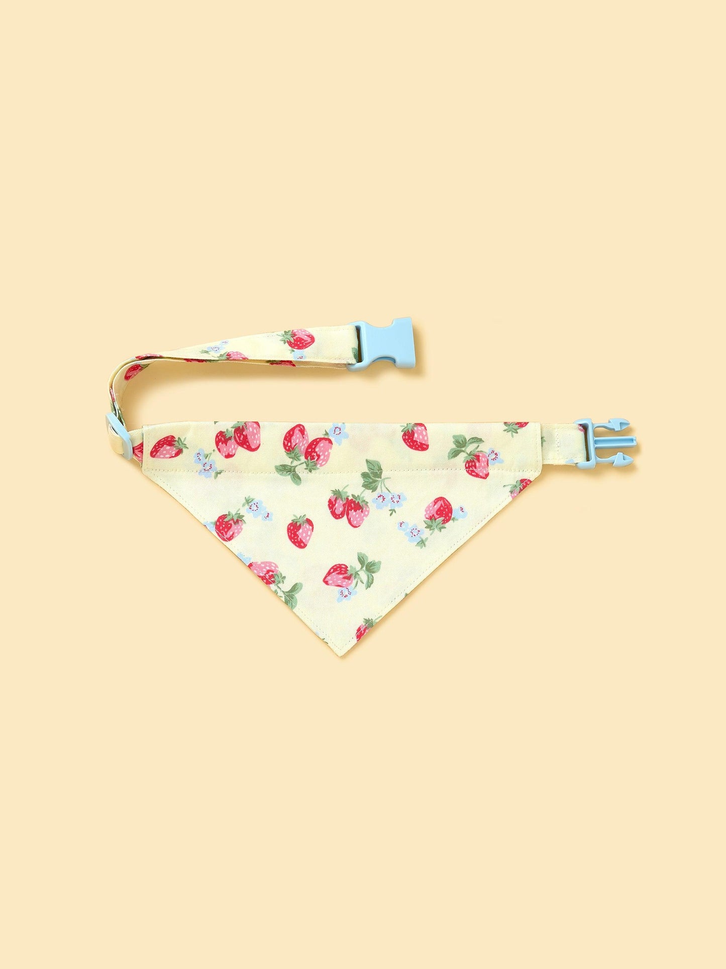 Yellow triangle bandana with strawberry fields pattern from BarkBarkBaby, featuring bright yellow fabric and playful fruit design.