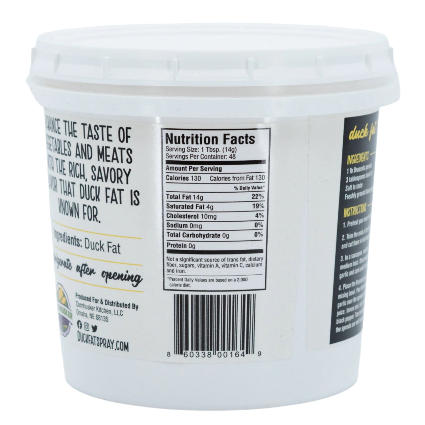 Rendered duck fat from Cornhusker Kitchen, 1.5 lb, gluten-free and non-GMO, shown in a jar on a kitchen countertop.