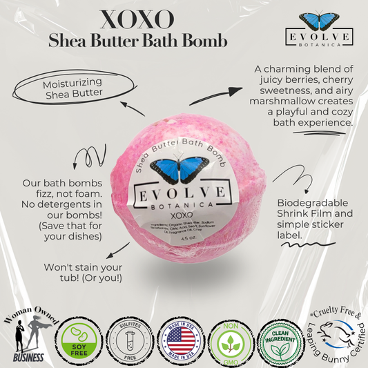 Evolve Botanica XOXO bath bomb, round and colorful with floral and heart patterns, ready for a relaxing bath.
