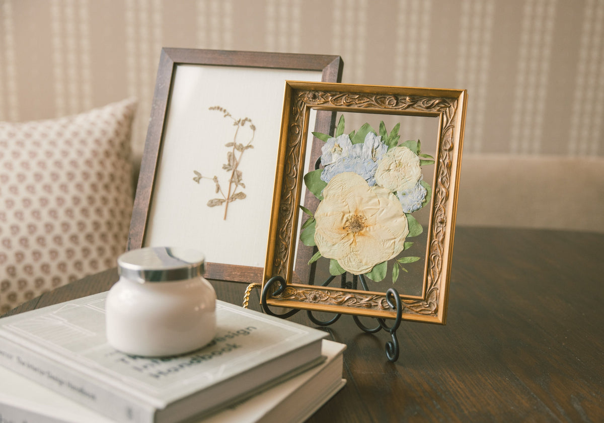 Pressed Floral boutonniere frame featuring preserved floral design for elegant wedding or event decoration.