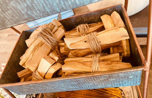 Three Palo Santo stick bundles from Onic Brands LLC, natural incense sticks for spiritual cleansing and aromatic use.