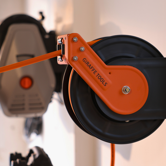 Giraffe Tools US retractable air hose reel with alloy steel reel, 3/8 inch diameter, available in 25 or 50 feet length.