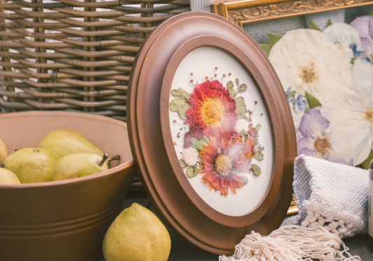 Pressed Floral boutonniere frame with a delicate floral arrangement in a clear display frame.