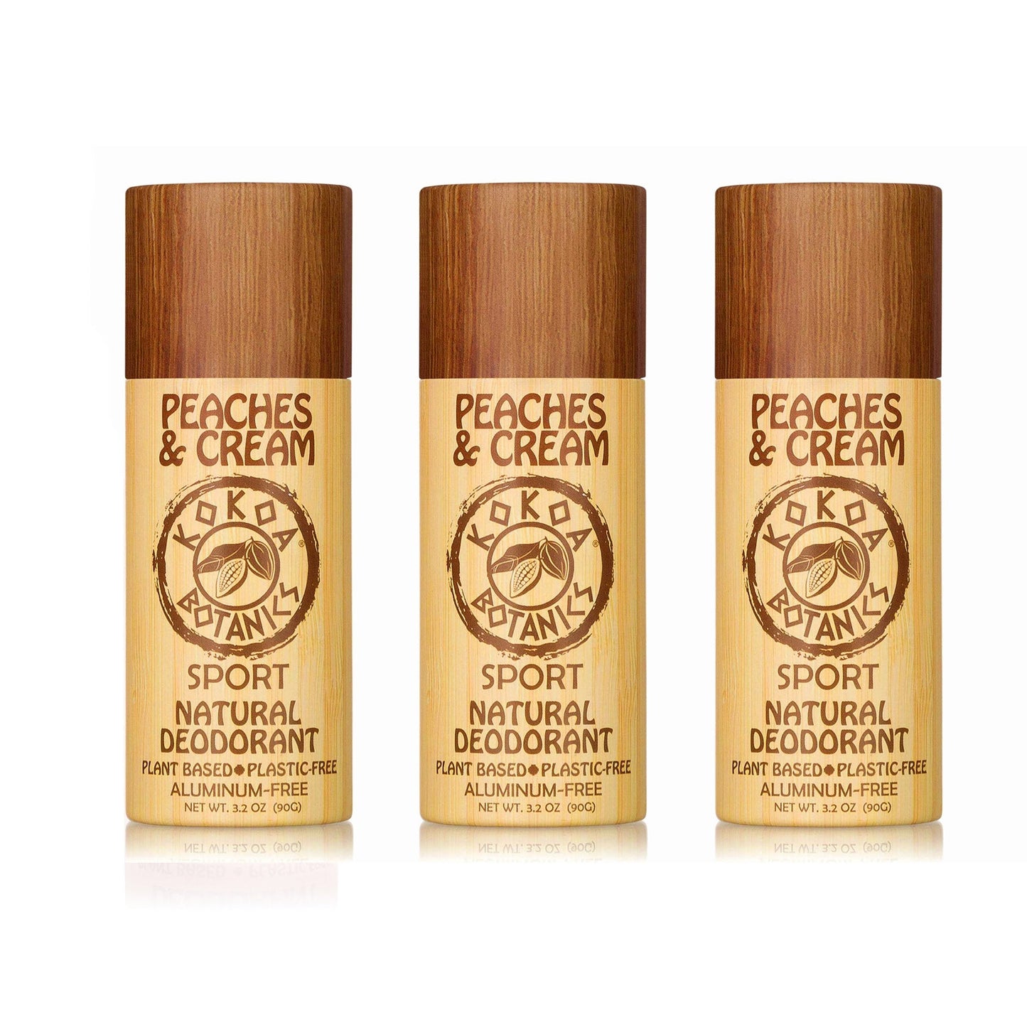 Three-pack of KOKOA BOTANICS natural deodorants in peach scent, aluminum-free, with white and peach packaging.