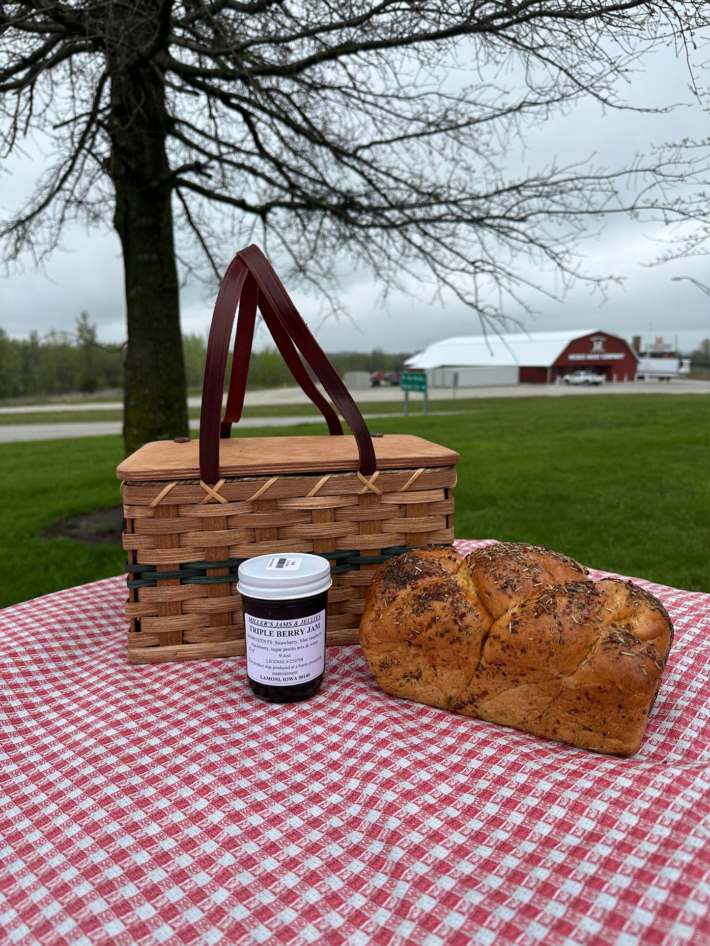 Amish Country Store triple berry jam jar with label, showcasing the Amish-made Amish jam product with fresh berries on the label.
