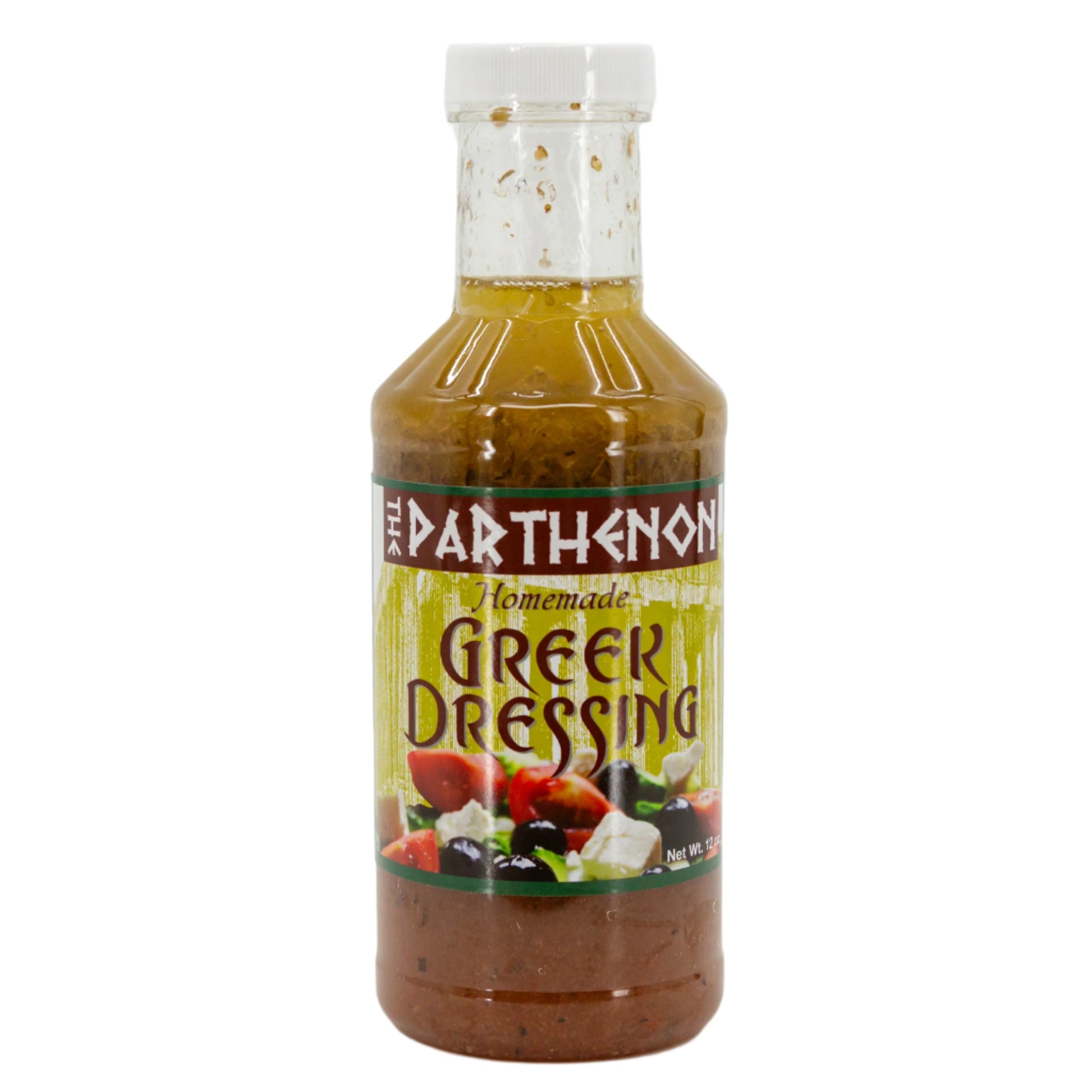 Homemade Greek dressing in a 12 oz bottle from The Parthenon Catering, featuring herbs and olive oil visible in the image.