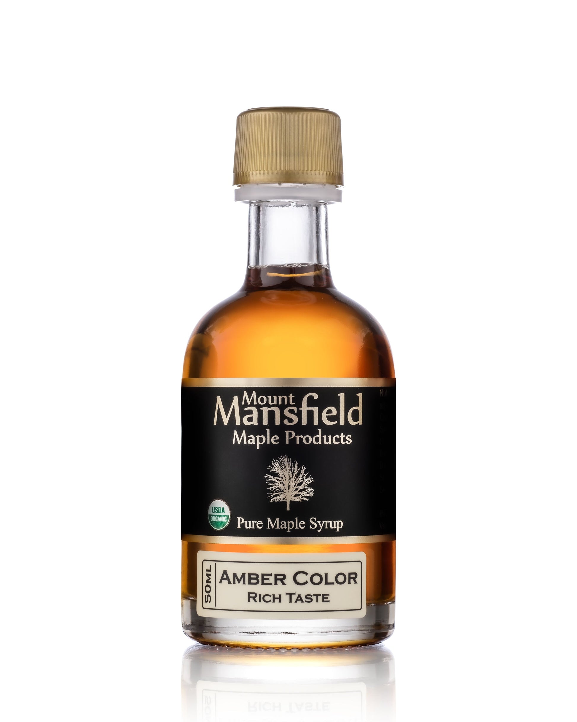 50ml bottle of Mount Mansfield Maple Products organic pure Vermont maple syrup in amber rich grade.