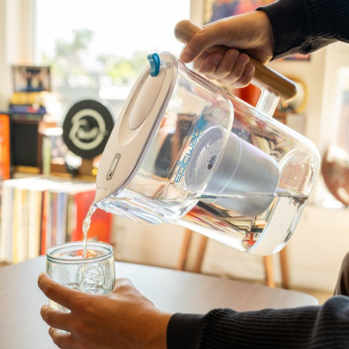 Pure XP pitcher by Epic Water Filters USA with red design, featuring a clear water pitcher with a filter cartridge inside.