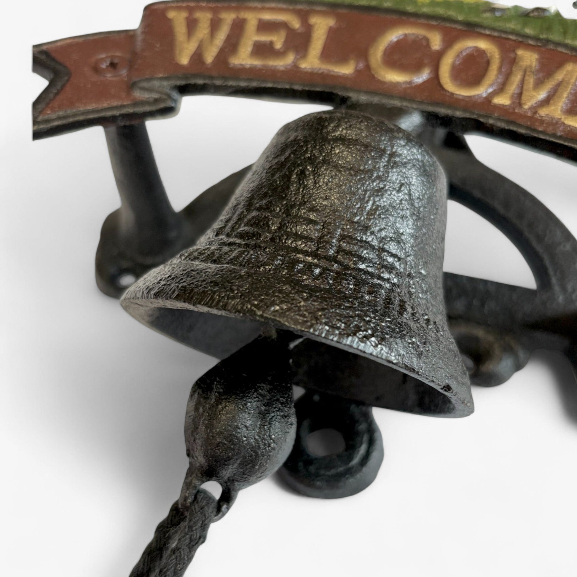 Rustic cast iron cow welcome bell sign from Iron & Blossom, farmhouse door decor featuring a vintage cow design and hanging bell.