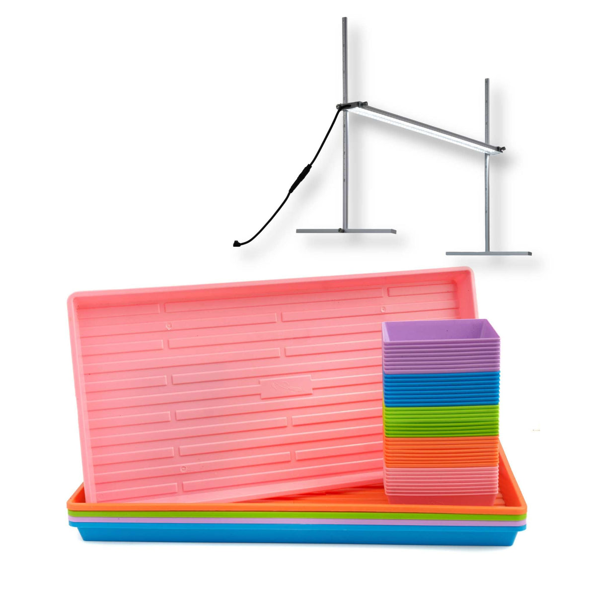 Bootstrap Farmer 5x5 Microgreens Kit with LED grow lights, featuring tray and seedling setup for indoor microgreen cultivation.